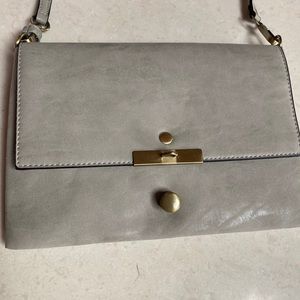 Grey purse. No name just fashion